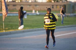 Runner in Bee costume